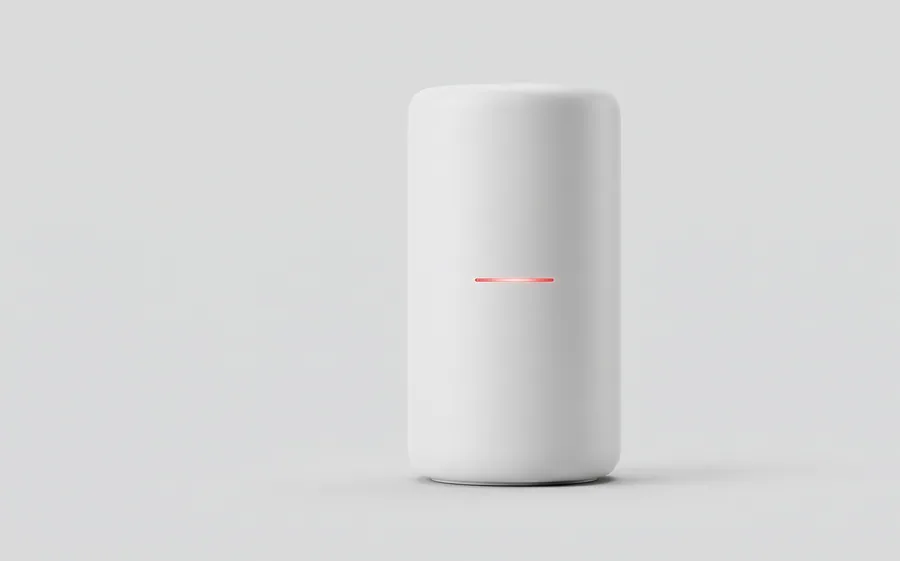A plain white cylindrical Wi-Fi router