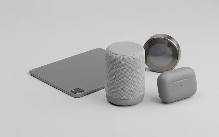 A tablet, smart speaker, earbuds case and thermostat dial